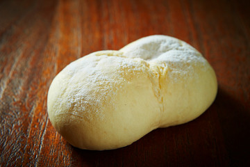soft bread on wooden background 