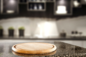 Desk of free space for your decoration and blurred kitchen interior 