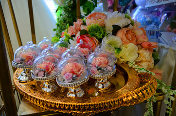 Wedding decor beige bonbonniere in a white basket