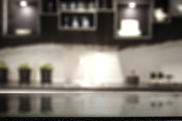 Desk of free space for your decoration and blurred kitchen interior 