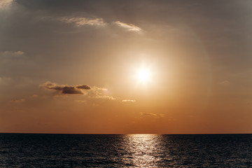 Beautiful warm sunset on the sea. Beautiful scenery. Charming sunset