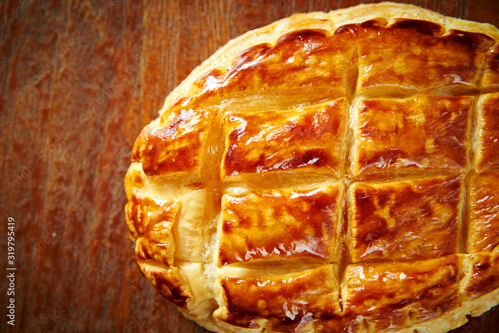 Sticker sweet danish pie on wooden background