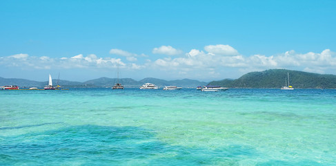blue sea, island and yachts. tropical landscape. Summer travel, adventure and sea trip vacation concept. copy space
