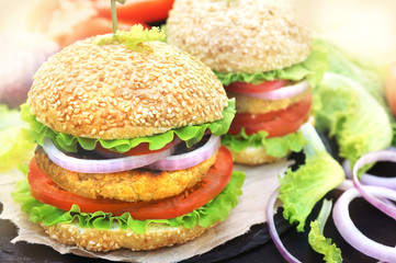 Veggie burger with chickpeas patty, vegan fast food, selective focus, toned
