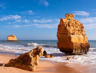 Beautiful rocky beach praia da marinha near Carvoeiro at the coast of Algarve, Portugal. Wonderful landscape and seascape for tourism and travel and nature topics