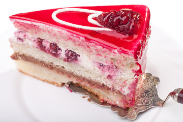 Piece of cake with red jelly