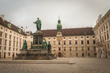 Fototapeta na wymiar The statue of Emperor Francis I. (in German: Kaiser Franz l. Denkmal) is seen at the courtyard of Hofburg Palace.