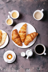 Fresh coffee with croissant