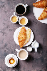Fresh coffee with croissant