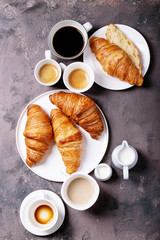 Fresh coffee with croissant