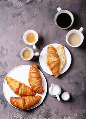 Fresh coffee with croissant