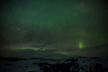 Fototapeta na wymiar Polarlicht über Island - Aurora borealis