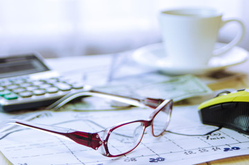clutter on a woman's desktop