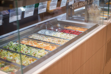 shop window, dining room, cafe with self-made products. Vegetable salad. Proper and healthy nutrition