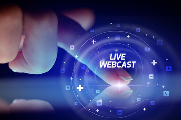 Finger touching tablet with social media icons and LIVE WEBCAST
