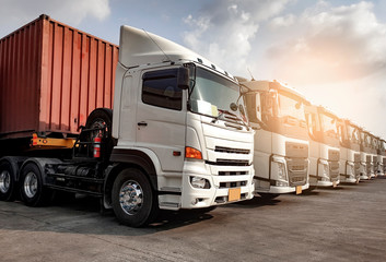 Semi Trailer Trucks the Parking lot at The Sunset Sky. Delivery Trucks. Cargo Shipping. Lorry....
