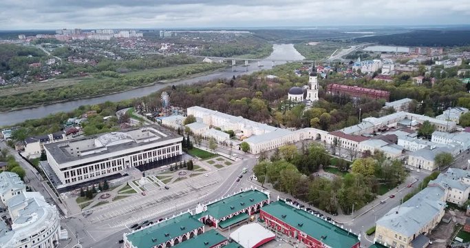 Aerial panoramic view of modern cityscape of Kaluga on banks of Oka river overlooking black domes of Holy Trinity Cathedral 