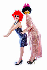 Attractive playful young women ready for carnival parties. Lifestyle and the concept of friendship:...