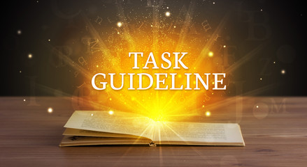 TASK GUIDELINE inscription coming out from an open book, educational concept