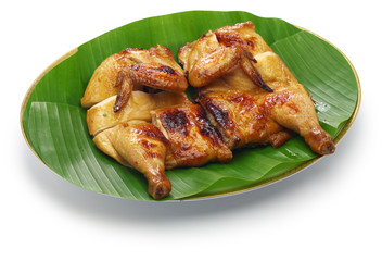 homemade gai yang, thai style grilled chicken isolated on white background