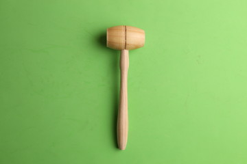 small wooden mallet made of pine wood