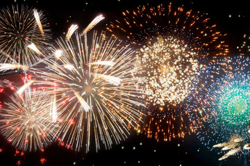 Fireworks and bokeh in New Year eve and copy space. Abstract background holiday.