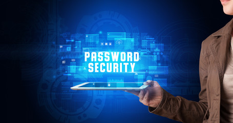 Young business person working on tablet and shows the digital sign: PASSWORD SECURITY