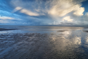 dramatic clouds over sea coast