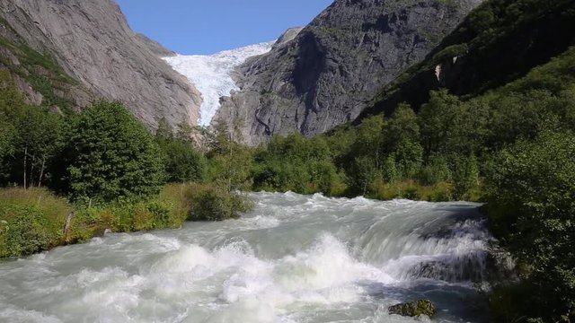 Beautiful Briksdal glacier in Norway wel known arm of the large Jostedalsbreen glacier in Oldedalen valley in Norway, Scandinavia