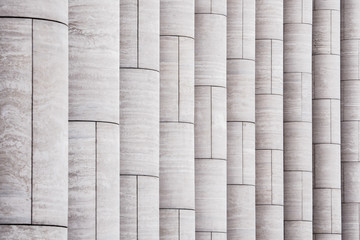 Pattern with vertical light marble columns.