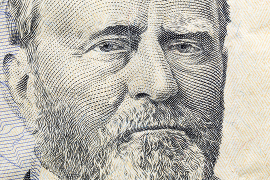 Macro close up photograph of Ulysses Grant on the US fifty dollar bill.