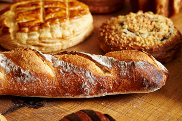 Various bread on wooden table 