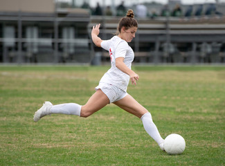 Girl Soccer player making exciting plays during a game © Joe