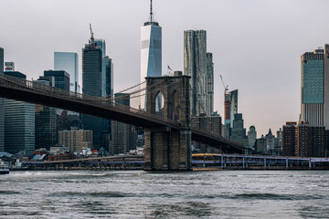 Fototapeta na wymiar Cloudy Daylight Traffic Over Brooklyn Bridge and The FDR Drive on the east side of Lower Manhattan