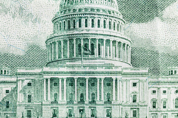 Macro close up photograph of the US Capitol buildingon the fifty dollar bill.