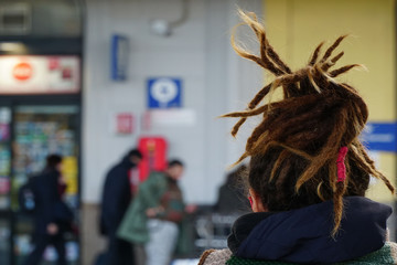 closeup head of a woman has Rastafarian hairstyle