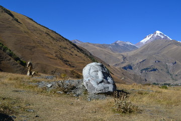 stone faces in the mountains of Georgia