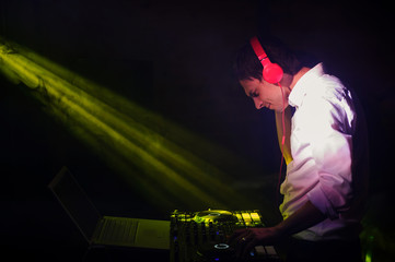 Young and beautiful man DJ