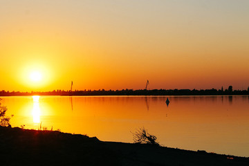 Naklejka premium sunset on river