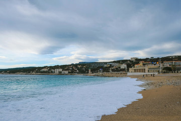 Mediterranean waves on the beach of the city of Cassis in France in the off-season. Copy space.