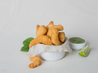 food, fried shrimp breaded with herbs and sauce, serving method