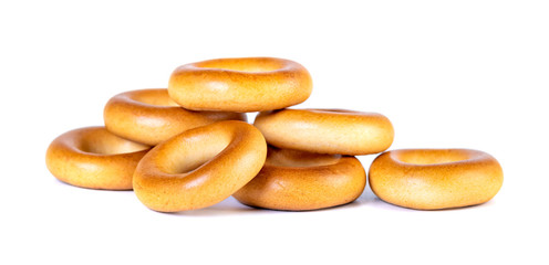 Small dry bagels, small rolls on a white background