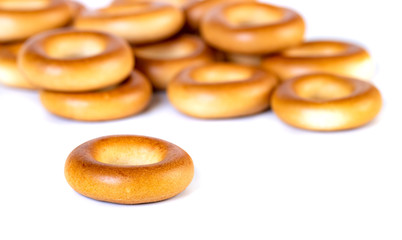 Small dry bagels, small rolls on a white background