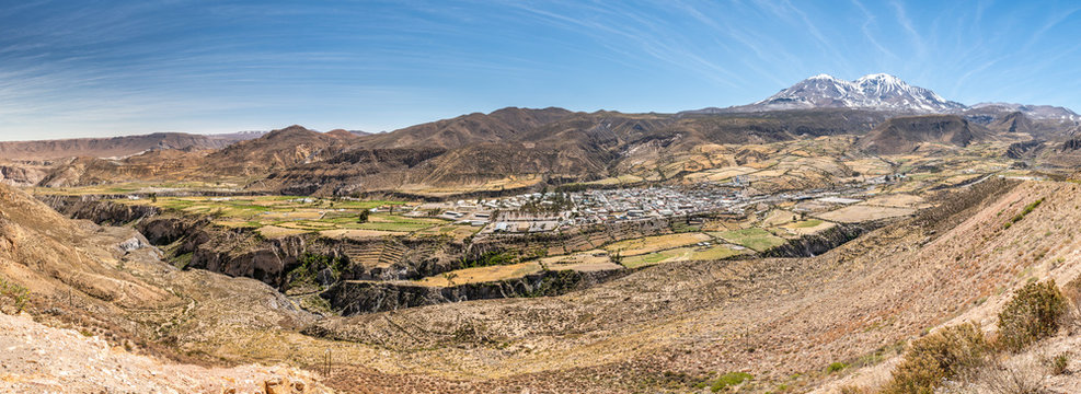 A panoramic view over Putre village inside a valley at Andes mountains. An amazing and idyllic scenery inside the Andes Altiplano at the driest desert in the world, Atacama