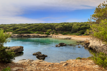 Salento: pebble beach of the Regional Natural Park Porto Selvaggio and Palude del Capitano in...