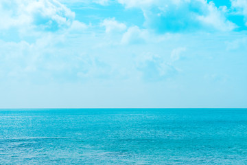 bright seascape with blue water and sky in the afternoon