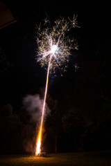 An amazing fireworks show during New Year's Eve celebration for the beginning of a happy new year on a nice Christmas in Spain, a colorful show in the night sky
