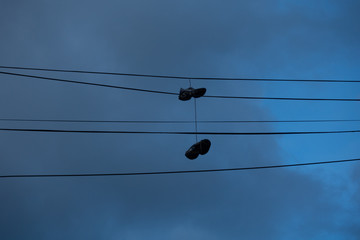 shoes on wires