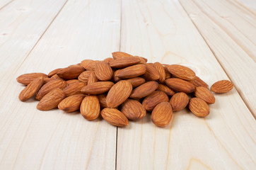 Almond isolated on wooden table