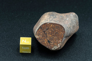 Inside slice of Chondrite Meteorite L Type isolated, piece of rock formed in outer space in the...